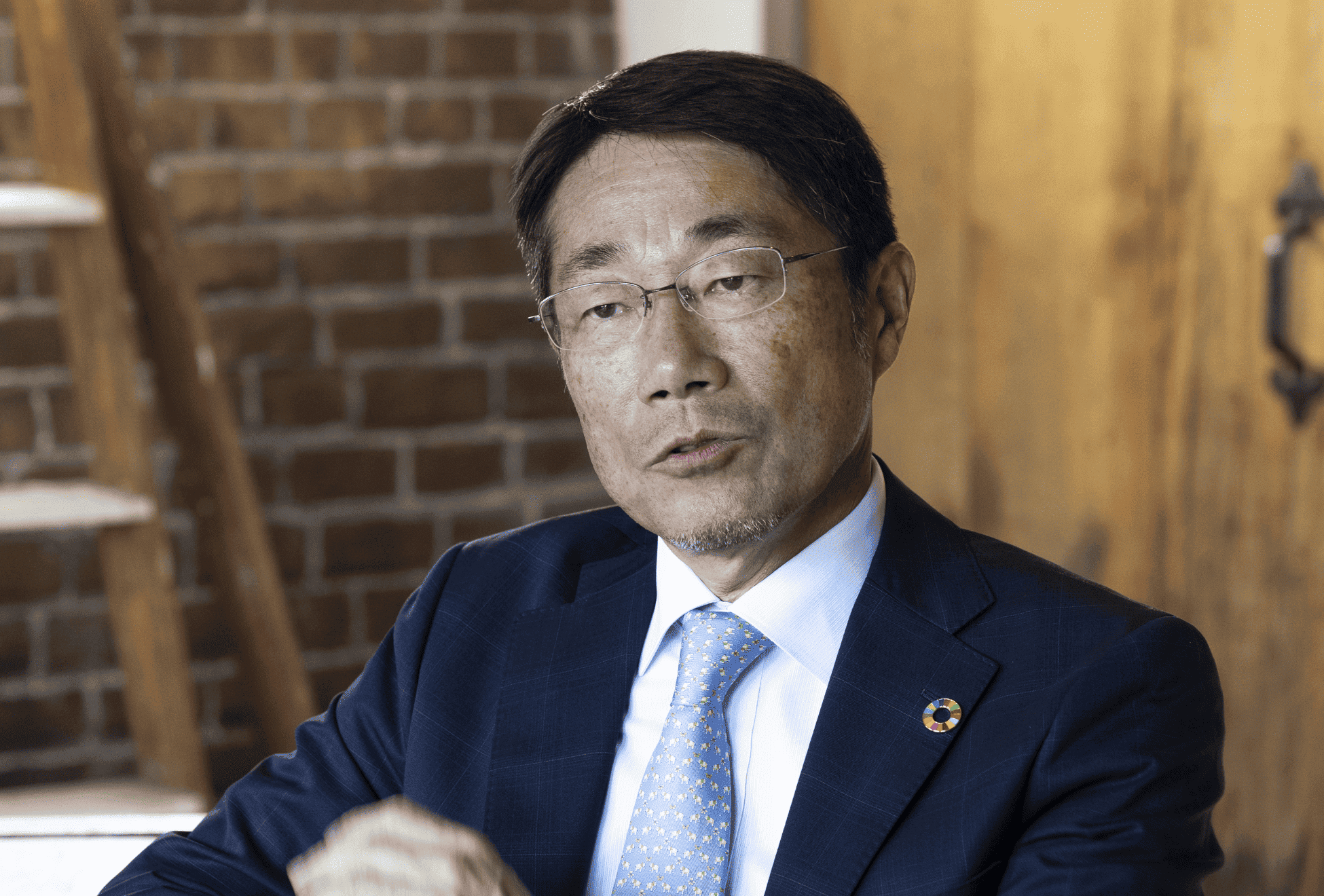 Takao Nukui, Executive Officer and President of MM Kenzai Co., Ltd., speaking.